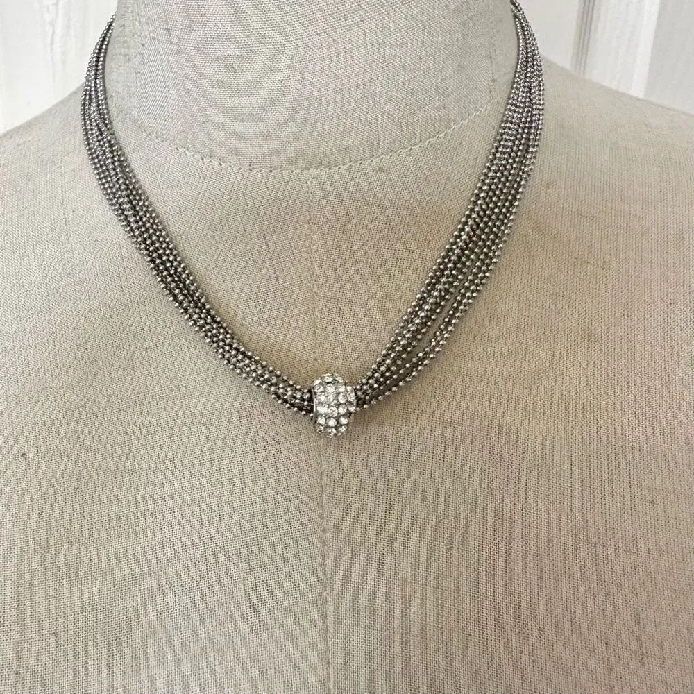 Silver tone multi strand rhinestone charm necklace